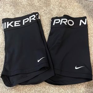 Two medium nike pros